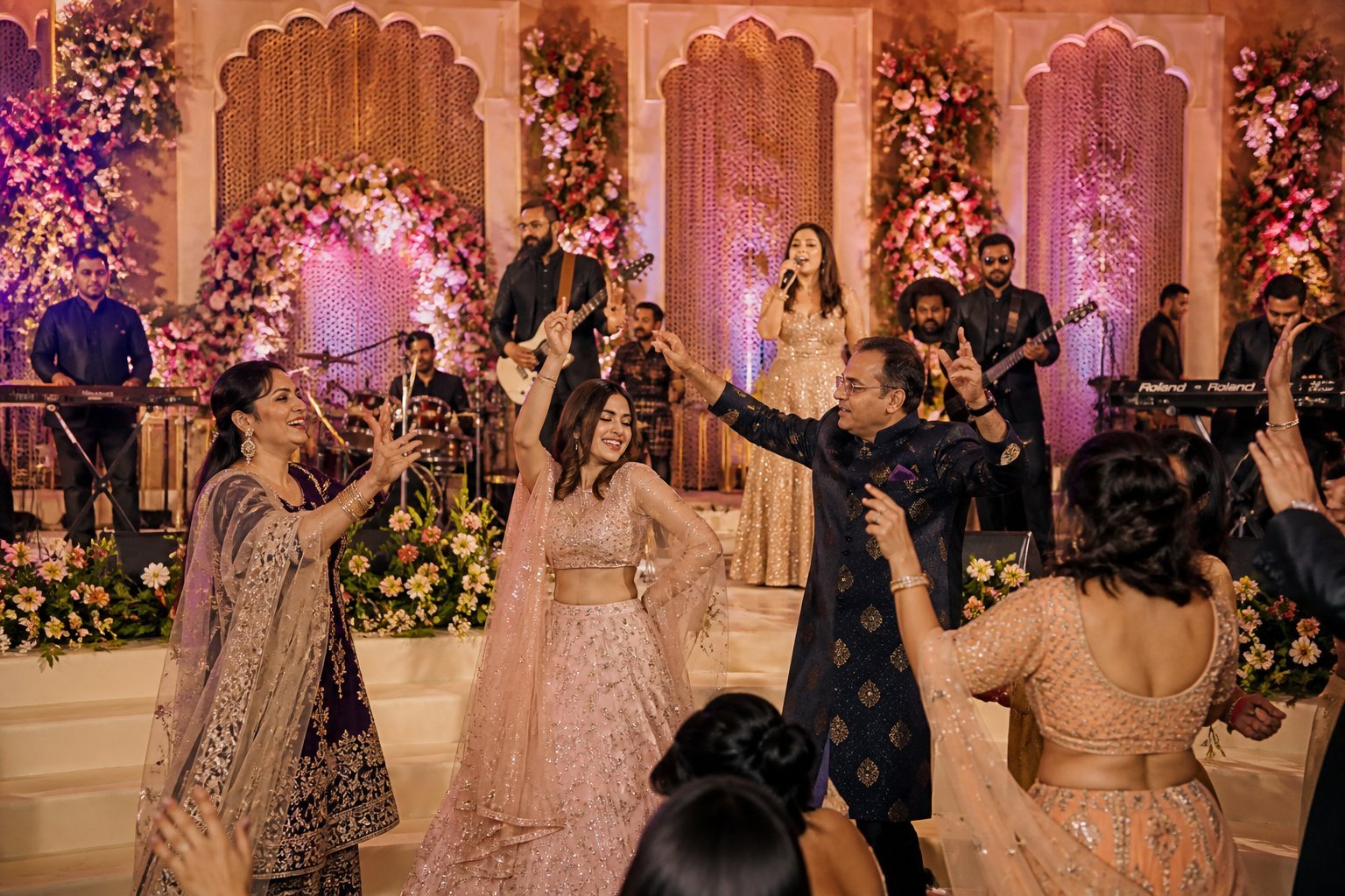 Family dancing during a lively Sangeet celebration